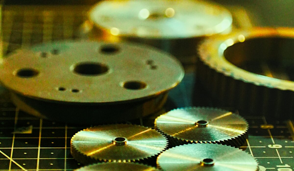 A variety of machined parts sitting on a table