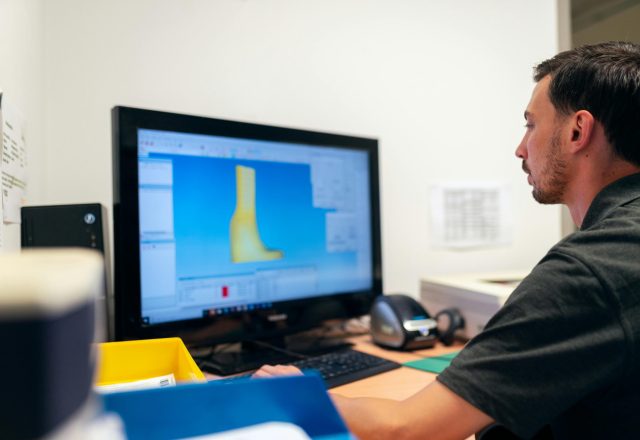 Employee working on a CAD Drawing